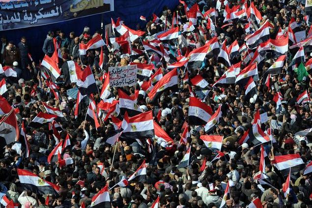 \\u00A9LaPresse CAIRO, Jan. 25, 2012 Egyptians participate in a rally marking the first anniversary of the ''January 25th Revolution'' on the Tahrir Square in Cairo, capital of Egypt, Jan. 25, 2012.