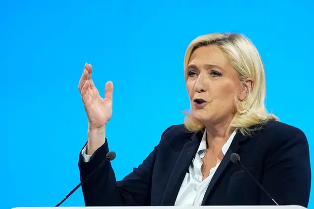 French far-right presidential candidate Marine Le Pen delivers her speech during a campaign rally in Aras, northern France, Thursday, April 21, 2022. Marine Le Pen is facing off against French President Emmanuel Macron and centrist candidate for the reelection in France's April 24 presidential runoff. (AP Photo/Michel Euler)