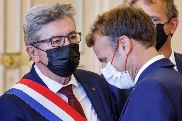(Jean-Luc M\\u00E9lenchon ed Emmanuel Macron. Foto AP)