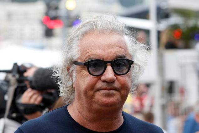 Former F1 Renault Team principal Flavio Briatore attends the Formula One Grand Prix, at the Monaco racetrack, in Monaco, Sunday, May 24, 2015. On Tuesday Aug. 25, 2020, Briatore has reportedly been admitted to hospital in Milan with coronavirus, there has been no official statement from the hospital but multiple reports say Briatore\\u2019s condition is serious but he is not in intensive care. (AP Photo/Luca Bruno)