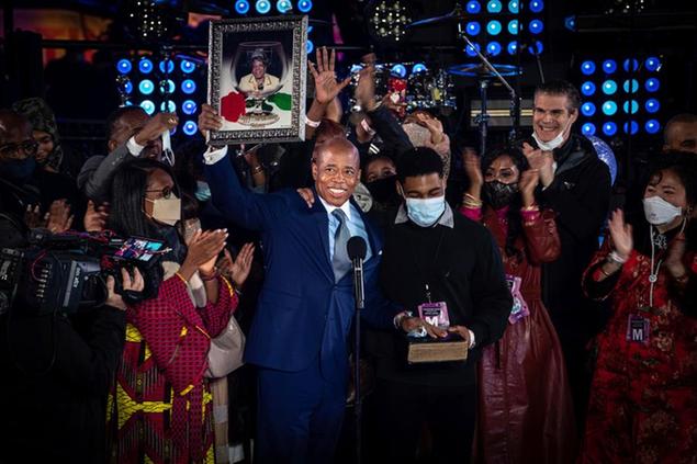 Eric Adams is sworn in as mayor of New York City on the stage of the New Year\\u2019s Eve celebration in New York\\u2019s Times Square on Saturday, Jan. 1, 2022. (AP Photo/Robert Bumsted)