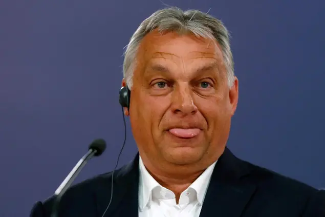 Hungarian Prime Minister Viktor Orban listens to a question during a press conference after a meeting with Serbian President Aleksandar Vucic in Belgrade, Serbia, Friday, May 15, 2020. Orban is on a one-day official visit to Serbia. (AP Photo/Darko Vojinovic)