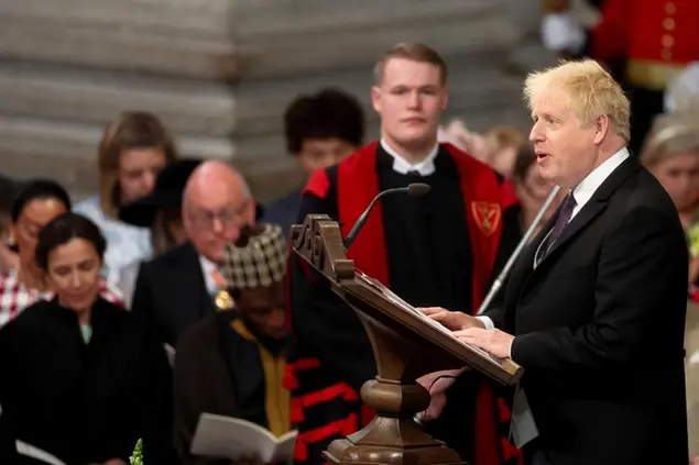 Britain's Prime Minister Boris Johnson gives a reading at the National Service of Thanksgiving held at St Paul's Cathedral as part of celebrations marking the Platinum Jubilee of Britain's Queen Elizabeth II, in London, Friday, June 3, 2022. (Phil Noble/Pool photo via AP)