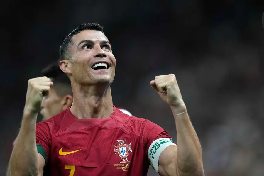 Portugal's Cristiano Ronaldo celebrates his side's opening goal during the World Cup group H soccer match between Portugal and Uruguay, at the Lusail Stadium in Lusail, Qatar, Monday, Nov. 28, 2022. (AP Photo/Themba Hadebe)