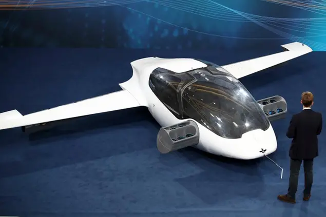 03 December 2018, Bavaria, N'rnberg: The prototype of the first airworthy \\\"flying taxi\\\", the eVTOL - electric vertical take-off and landing jet - from the manufacturer Lilium, will be exhibited at the Digital Summit. The two-day digital summit of the Federal Government is held under the motto \\\"Artificial intelligence - a key to growth and prosperity\\\". Photo by: Daniel Karmann/picture-alliance/dpa/AP Images