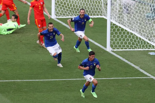 June 20, 2021, Rome, United Kingdom: Rome, Italy, 20th June 2021. Matteo Pessina of Italy is pursued by team mates Rafael Toloi and Leonardo Bonucci after scoring to give the side a 1-0 lead during the UEFA Euro 2020 match at Stadio Olimpico, Rome. Picture credit should read: Jonathan Moscrop / Sportimage(Credit Image: © Jonathan Moscrop/CSM via ZUMA Wire) (Cal Sport Media via AP Images)