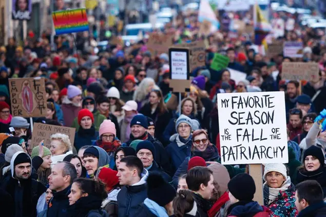 epa11836501 A participant holds a placard reading 'My favorite season is the fall of the patriarchy' at the 'Flinta March' in Berlin, Germany, 19 January 2025. The march is organized in response to the threat to the rights of women, intersex, non-binary, trans, and agender people. EPA/CLEMENS BILAN
