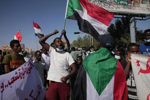 Thousands of protesters take to the streets to renew their demand for a civilian government in the Sudanese capital Khartoum, Thursday, Nov. 25, 2021. The rallies came just days after the military signed a power-sharing deal with the prime minister, after releasing him from house arrest and reinstating him as head of government. The deal came almost a month after the generals orchestrated a coup. Sudan’s key pro-democracy groups and political parties have dismissed the deal as falling short of their demands for a fully civilian rule.Â\\u00A0(AP Photo/Marwan Ali)