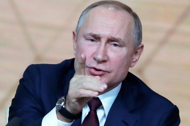 FILE - Russian President Vladimir Putin gestures during his annual news conference in Moscow, Russia, Dec. 19, 2019. For years, Russian President Vladimir Putin could sit back and relish in unseemly scenes of Western disunity, ranging from the Britain's Brexit move out of the EU in 2016, Hungary's longstanding antipathy towards its EU headquarters and, equally, the rift created by former President Donald Trump that has far from fully healed under under Joe Biden. (AP Photo/Pavel Golovkin, File)