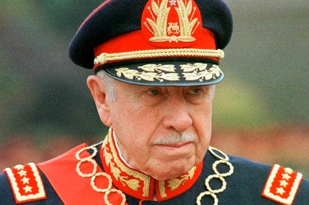 FILE - This March 10, 1998 file photo, shows former Chilean Gen. Augusto Pinochet, in Santiago, Chile. Chile\\u00E2\\u20AC\\u2122s Supreme Court announced Friday, Aug. 24, 2018, it has ordered the seizure of $1.6 million from the assets of the late dictator. (AP Photo/Santiago Llanquin, File)