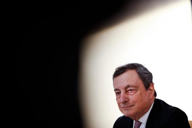 Italy's Prime Minister Mario Draghi speaks during a media conference at an EU summit in Porto, Portugal, Saturday, May 8, 2021. On Saturday, EU leaders hold an online summit with India's Prime Minister Narendra Modi, covering trade, climate change and help with India's COVID-19 surge. (AP Photo/Francisco Seco, Pool)