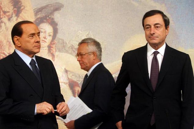 L'allora presidente del Consiglio Silvio Berlusconi, il ministro dell'Economia Giulio Tremonti e il governatore di Bankitalia Mario Draghi (\\u00A9 Marco Merlini / LaPresse)