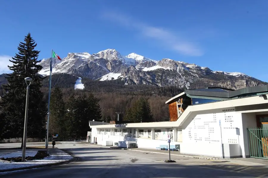 A view of the Palazzo del Ghiaccio (Ice Palace) in Cortina D'Ampezzo, northern Italy, Wednesday, Jan. 16, 2019. A wide swath of northern Italy will benefit from 1 billion euros ($1.2 billion) in infrastructure development that the government has signed off on to improve access to the venues for the Milan-Cortina Winter Olympics in 2026. (AP Photo/Marco Trovati)