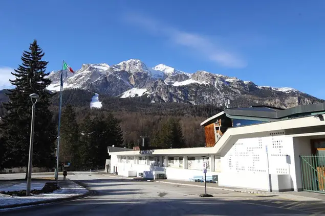 A view of the Palazzo del Ghiaccio (Ice Palace) in Cortina D'Ampezzo, northern Italy, Wednesday, Jan. 16, 2019. A wide swath of northern Italy will benefit from 1 billion euros ($1.2 billion) in infrastructure development that the government has signed off on to improve access to the venues for the Milan-Cortina Winter Olympics in 2026. (AP Photo/Marco Trovati)
