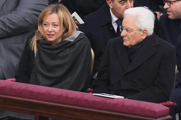 Italian President Sergio Mattarella, left, and Italian Prime Minister Giorgia Meloni attend the funeral mass for late Pope Emeritus Benedict XVI in St. Peter's Square at the Vatican, Thursday, Jan. 5, 2023. Benedict died at 95 on Dec. 31 in the monastery on the Vatican grounds where he had spent nearly all of his decade in retirement, his days mainly devoted to prayer and reflection. (AP Photo/Antonio Calanni) Associated Press/LaPresse Only Italy and Spain