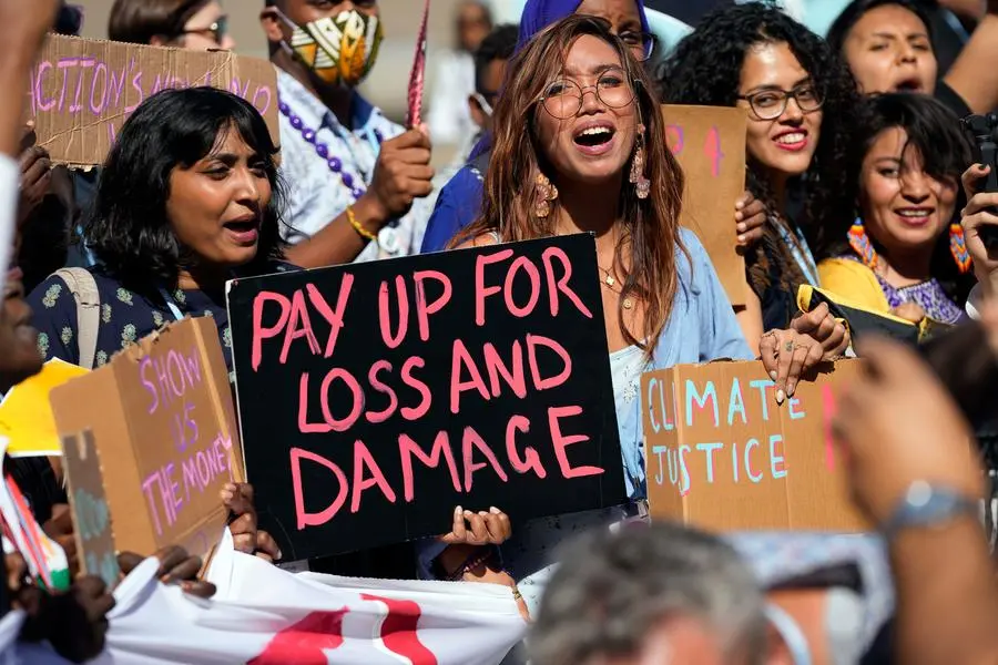Mitzi Jonelle Tan, of the Philippines, center, participates in a Fridays for Future protest calling for pay for loss and damage at the COP27 U.N. Climate Summit, Friday, Nov. 11, 2022, in Sharm el-Sheikh, Egypt. (AP Photo/Peter Dejong) Associated Press/LaPresse Only Italy and Spain