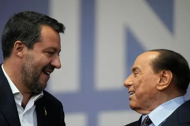 Forza Italia party leader Silvio Berlusconi, right, and The League party leader Matteo Salvini attend the center-right coalition closing rally in Rome, Sept. 22, 2022. (AP Photo/Gregorio Borgia)