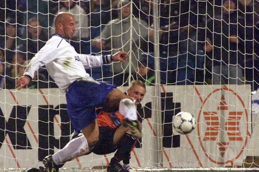 Chelsea's Gianluca Vialli scores the first goal against Valerenga during Thursday, March 18,1999, in their European Cup Winner Cup quarterfinals, second leg, at Oslo's Ullevaal stadium. Valerenga goalie Mikko Kaven in background. (AP Photo/Erik Johansen)