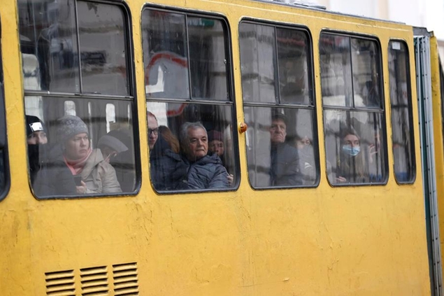 People ride a train in Lviv, western Ukraine, on April 5, 2022, amid the Russian invasion of the country. (Kyodo via AP Images) ==Kyodo