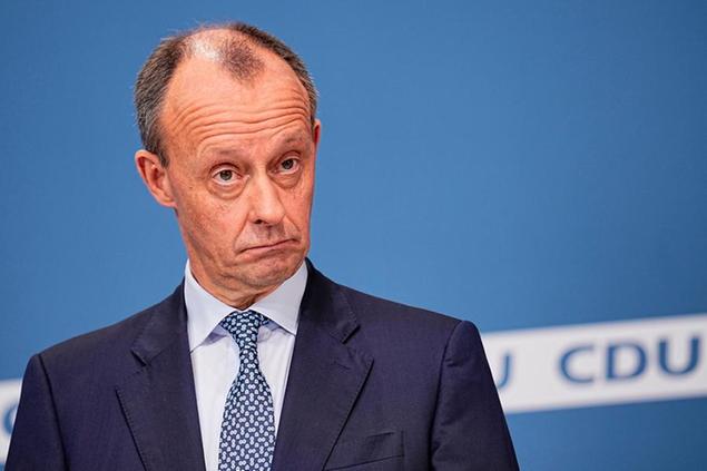 17 December 2021, Berlin: Friedrich Merz (CDU) stands after the announcement of the results of the CDU member poll. He is to become the new party leader according to the will of the CDU members. The new federal chairman is to be elected by the delegates at a CDU party conference in January 2022. Photo by: Michael Kappeler/picture-alliance/dpa/AP Images