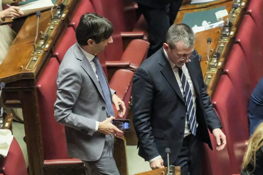 Foto Mauro Scrobogna/LaPresse 14-02-2023 Roma (Italia) Politica - Camera dei Deputati, Conversione in legge del DL sulla gestione dei flussi migratori - Nella foto: Giovanni Donzelli Fdi e Andrea Delmastro delle Vedove FDI February 14, 2023 Rome (Italy) Politics - Chamber of Deputies, Conversion into law of the Decree on the management of migratory flows - In the photo: Giovanni Donzelli Fdi and Andrea Delmastro delle Vedove FDI