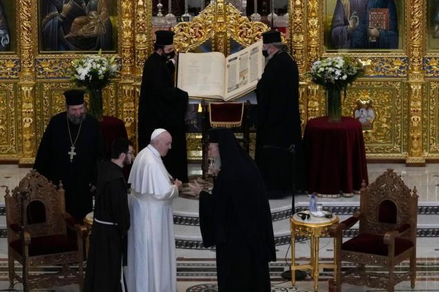 Pope Francis attends a ceremony at the Apostolos Barnavas Orthodox Cathedral in Nicosia, Cyprus, Friday, Dec. 3, 2021. Francis is on a five-day trip to Cyprus and Greece by drawing attention once again to his call for Europe to welcome migrants. (AP Photo/Petros Karadjias)