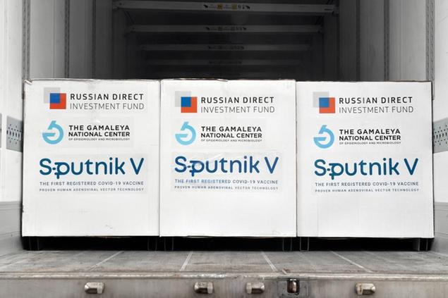 Boxes of Sputnik V vaccines are ready to be unloaded from a truck at a warehouse of Hungaropharma, a Hungarian pharmaceutical wholesale company, in Budapest, Hungary, Thursday, March 4, 2021. (Zoltan Mathe/MTI via AP)