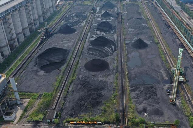 An aerial view of the coal yard for Meishan Steel, a subsidiary of BaoSteel, in Nanjing in east China's Jiangsu province Thursday, Aug. 19, 2021. (FeatureChina via AP Images)