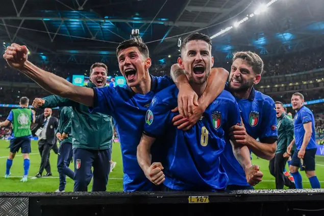 Italy players celebrate after winning the Euro 2020 soccer championship semifinal match against Spain at Wembley stadium in London, England, Tuesday, July 6, 2021. (Justin Tallis/Pool Photo via AP)