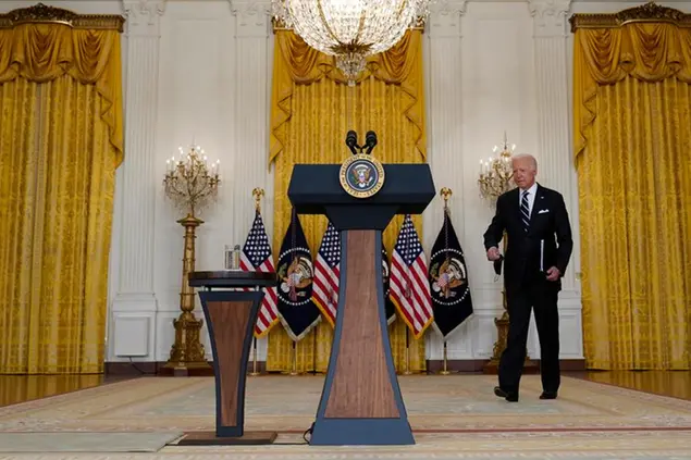 President Joe Biden walks up to speak from the East Room of the White House in Washington, Wednesday, Aug 18, 2021, on the COVID-19 response and vaccination program. U.S. health officials Wednesday announced plans to offer COVID-19 booster shots to all Americans to shore up their protection amid the surging delta variant and signs that the vaccines' effectiveness is falling. (AP Photo/Susan Walsh)