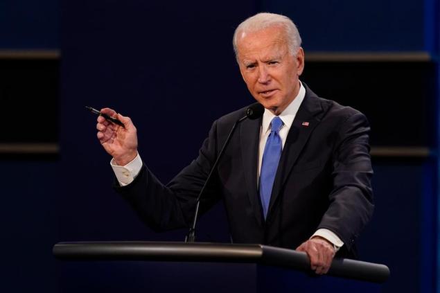 Democratic presidential candidate former Vice President Joe Biden gestures while speaking during the second and final presidential debate Thursday, Oct. 22, 2020, at Belmont University in Nashville, Tenn. (AP Photo/Patrick Semansky)