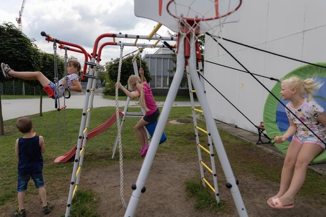Ukrainian refugee children play on a playground at a refugee shelter in Warsaw, Poland, Wednesday, Aug. 17, 2022. As Russia\\u00E2\\u20AC\\u2122s war against Ukraine reaches the sixth-month mark, many refugees are coming to the bitter realization that they will not be returning home soon. With shelling around a nuclear power plant and missiles threatening even western regions of Ukraine, many refugees don\\u00E2\\u20AC\\u2122t feel safe at home, even if those areas are under Ukrainian control. (AP Photo/Michal Dyjuk)