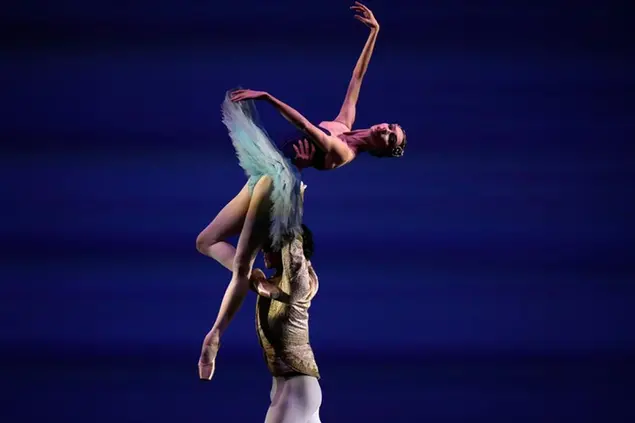 Bolshoi\\\\'s former etoile, Olga Smirnova, top and Dutch National Ballet\\\\'s soloist Victor Caixeta perform during a benefit performance for Ukraine at the Naples\\\\' San Carlo theater, Monday, April 4, 2022. Among the starts in the event there was Anastasia Gurskaya, a top ballerina in Kyiv\\\\'s Opera, and prima ballerina Olga Smirnova, who quit the Bolshoi last month and is now dancing with the Dutch National Ballet. (AP Photo/Alessandra Tarantino)
