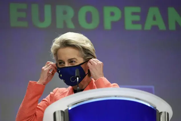FILE - in this file photo dated Wednesday, July 14, 2021, European Commission President Ursula von der Leyen puts on her protective facemask after a media conference at EU headquarters in Brussels. European Union chief Ursula von der Leyen on Thursday July 22, 2021, has flatly refused to renegotiate a post-Brexit trade deal with the U.K. after a Prime Minister Boris Johnson urged the bloc to work with British officials to find “practical solutions” to red tape and inspections that are causing shortages in Northern Ireland. (AP Photo/Valeria Mongelli, FILE)