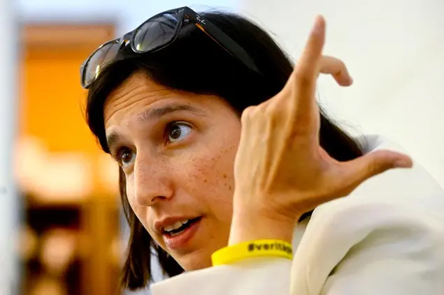 Elly Schlein, an independent candidate who runs with the Democratic Party, talks during an interview with the Associated Press in Modena, Italy, Friday, Sept. 2, 2022. Schlein, a 37-year-old U.S.-Italian national, often compared with U.S. Rep. Alexandria Ocasio-Cortez for her platform advocating social justice is on the road in a national campaign aimed at challenging the overriding storyline that the united right will easily defeat the left in the Sept. 25 vote.\\u00A0(AP Photo/Marco Vasini)