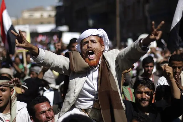 An elderly protester chants slogans during a demonstration demanding the prosecution of Yemen's President Ali Abdullah Saleh in Sanaa, Yemen, Sunday, Dec. 25, 2011. (AP Photo/Hani Mohammed)