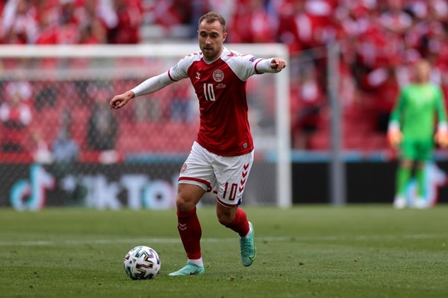 FILE - Denmark's Christian Eriksen controls the ball during the Euro 2020 soccer championship group B match between Denmark and Finland at Parken stadium in Copenhagen, June 12, 2021. Eriksen has resumed training in Denmark as part of his rehabilitation after suffering a cardiac arrest at the European Championship. The 29-year-old midfielder is using a field at Odense Boldklub, the club where he started his career before playing for Ajax, Tottenham and most recently Inter Milan before collapsing while playing for Denmark in June. (Wolfgang Rattay/Pool via AP, file)