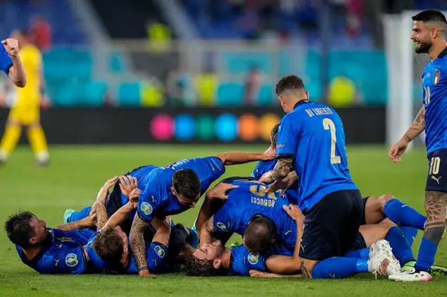 Italy players celebrate their second goal during the Euro 2020 soccer championship group A match between Italy and Switzerland at the Olympic stadium in Rome, Italy, Wednesday, June 16, 2021. (AP Photo/Alessandra Tarantino, Pool)