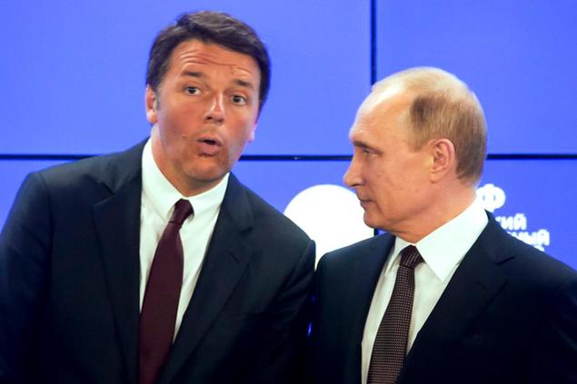 Russian President Vladimir Putin, right, and Italian Premier Matteo Renzi attend a signing ceremony of agreements on the sidelines of the St. Petersburg International Economic Forum in St. Petersburg, Russia, Friday, June 17, 2016. (AP Photo/Dmitry Lovetsky)