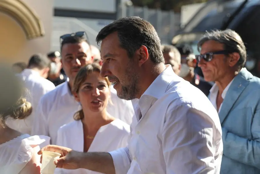 Italy's former Interior minister, Matteo Salvini and Leader of The League party, talks to journalists after visiting the migrant reception center in the Sicilian Island of Lampedusa, Italy, Thursday, Aug. 4, 2022. Salvini is making a stop Thursday on Italy's southernmost island of Lampedusa, the gateway to tens of thousands of migrants arriving in Italy each year across the perilous central Mediterranean Sea. (AP Photo/David Lohmueller)