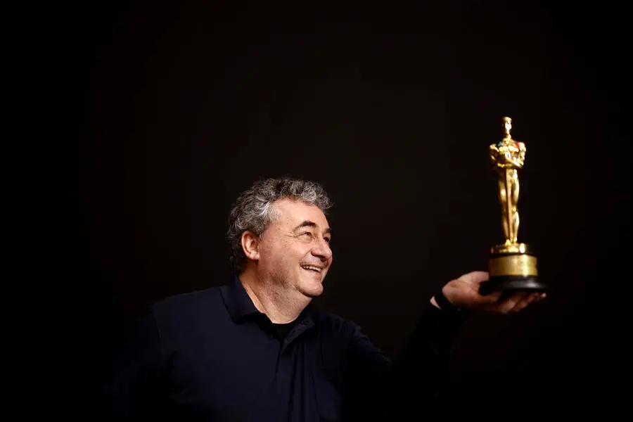 17 March 2022, Brandenburg, Potsdam: Gerd Nefzer, 2018 Oscar winner in the \\\"Best Visual Effects\\\" category in the film \\\"Blade Runner 2049,\\\" holds his Oscar in his hands at Studio Dark Bay in Babelsberg. This year he is nominated for an Oscar for the special effects in the film \\\"Dune\\\". Photo by: Carsten Koall/picture-alliance/dpa/AP Images