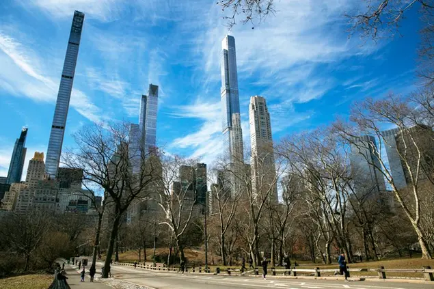 The luxury, residential skyscraper buildings of \\\"Billionaire's Row\\\" in Manhattan are visible from Central Park in New York City, Feb. 20, 2022. The U.S. grew wealthier, better educated, young adults moved less and poverty declined during the second half of the last decade, according to new data released Thursday, March 17, 2022 by the U.S. Census Bureau. (AP Photo/Ted Shaffrey)