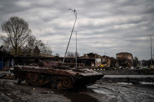 A destroyed tank is seen at the the town of Borodyanka, Ukraine, on Saturday, April 9, 2022. Russian troops occupied the town of Borodyanka for weeks. Several apartment buildings were destroyed during fighting between the Russian troops and the Ukrainian forces in the town around 40 miles northwest of Kiev. (AP Photo/Petros Giannakouris)