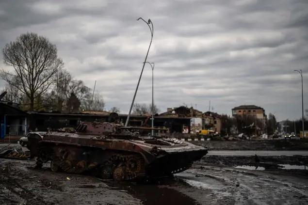 A destroyed tank is seen at the the town of Borodyanka, Ukraine, on Saturday, April 9, 2022. Russian troops occupied the town of Borodyanka for weeks. Several apartment buildings were destroyed during fighting between the Russian troops and the Ukrainian forces in the town around 40 miles northwest of Kiev. (AP Photo/Petros Giannakouris)