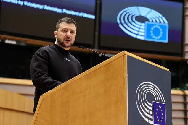 Ukraine's President Volodymyr Zelenskyy speaks during an EU summit at the European Parliament in Brussels, Belgium, Thursday, Feb. 9, 2023. On Thursday, Zelenskyy will join EU leaders at a summit in Brussels, which German Chancellor Olaf Scholz described as a \\\"signal of European solidarity and community.\\\" (AP Photo/Olivier Matthys)