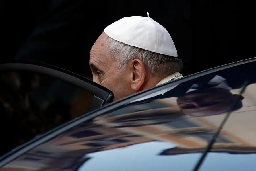 Pope Francis boards a car as he leaves the St. Ignazio church after celebrating a Mass of Thanksgiving for the Canonization of St. Jose de Anchieta, a Spanish Jesuit Missionary to Brazil, in Rome Thursday, April 24, 2014. (AP Photo/Gregorio Borgia)
