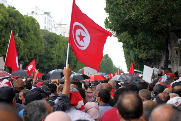 Tunisians demonstrate against Tunisian President Kais Saied in Tunis, Tunisia. Sunday, Oct. 10, 2021. Thousands of people demonstrated in Tunisiaâ€™s capital Sunday against the presidentâ€™s seizure of powers in July and other moves seen as threatening the countryâ€™s democratic gains since the Arab Spring. (AP Photo/Hassene Dridi)