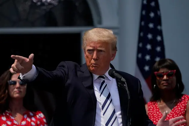 Former President Donald Trump imitates the shooting a gun with his finger while talking about gun violence in Chicago as he speaks at Trump National Golf Club in Bedminster, N.J., Wednesday, July 7, 2021. (AP Photo/Seth Wenig)