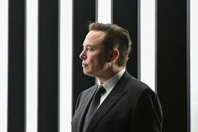 FILE - Elon Musk, Tesla CEO, attends the opening of the Tesla factory Berlin Brandenburg in Gruenheide, Germany, March 22, 2022. Tesla CEO Elon Musk has proposed a peace plan for Ukraine that would involve holding repeat votes under the U.N. auspices in Russia-occupied regions, triggering a showdown with Ukrainian Twitter users who have rejected his proposals in a stream of furious comments. (Patrick Pleul/Pool via AP, File)
