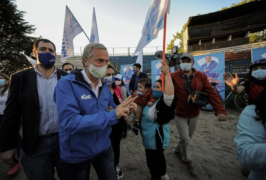 Chilean Republican Party presidential candidate Jose Antonio Kast greets supporters during an electoral camping rally in Valdivia, Chile, Wednesday, Nov. 17, 2021. Chile will hold its presidential election on Nov. 21. (AP Photo/Jose Luis Saavedra)